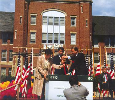 Northwest President Dean Hubbard, Missouri Governor John Ashcroft and President of the Maryville Chamber of Commerce, Kay Wilson, ceremonially switch on the Electronic Campus on August 18, 1987.  Northwest became the first "electronic campus" in the nation.